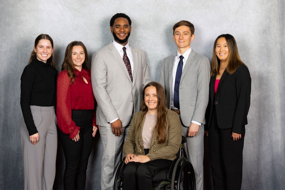 A photo of six students being honored for being chosen as Citizen Scholars.